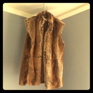 Mid length faux fur vest